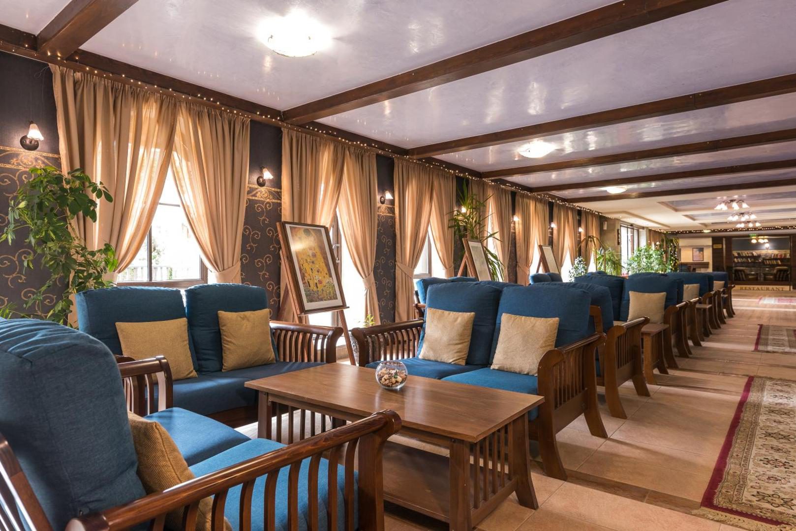 Grand Royale Apartment Complex & Spa – lounge cu șemineu Grand Royale Apartment Complex & Spa – lounge cu șemineu